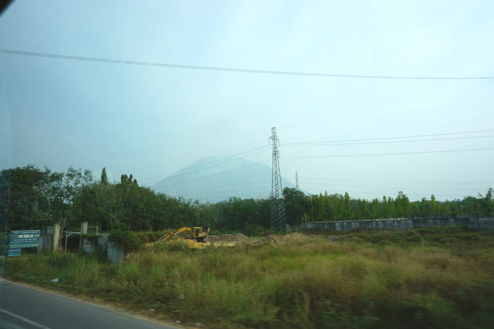 Ba Den mountain surrounded by farmland.