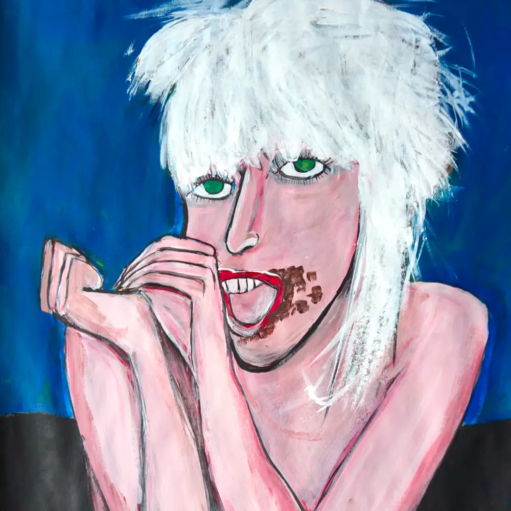 Lady Gaga nail polish eye makeup and cake crumbs.