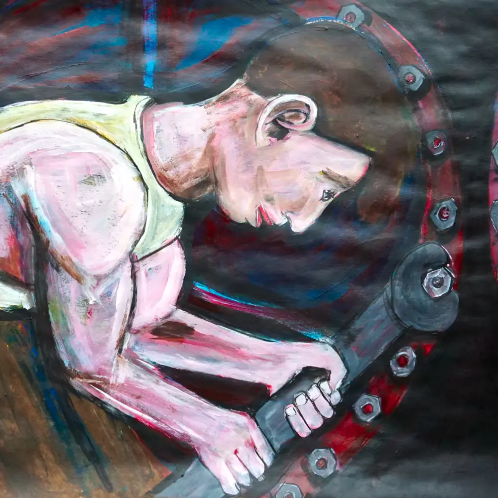 Muscles tighten with wrench in hand.