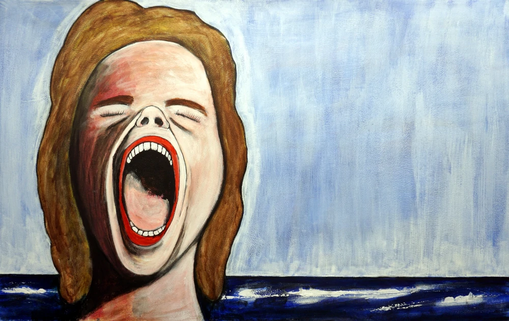 Land Breeze screaming lips spread, at the shoreline.