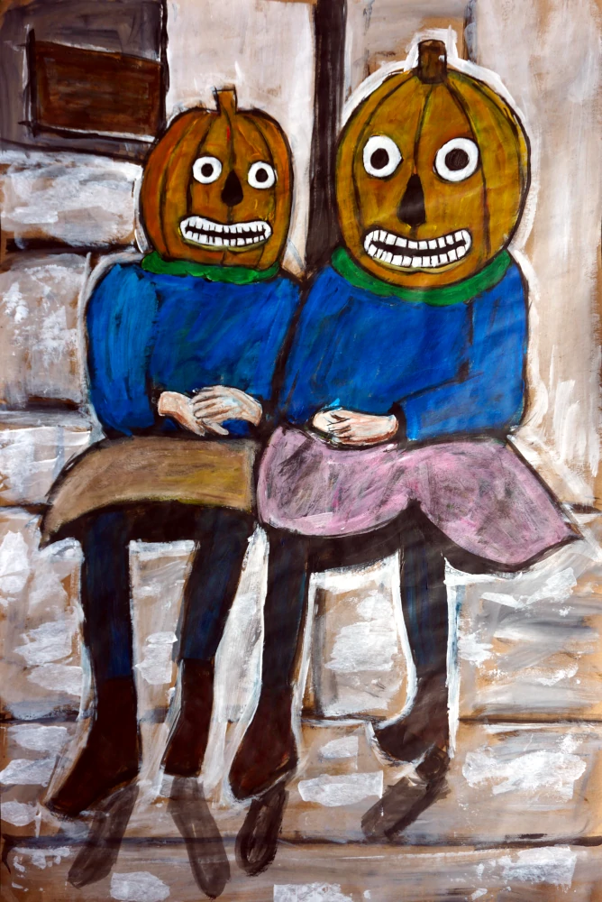 Matching Jackets, blue and orange Jack O'lantern heads.